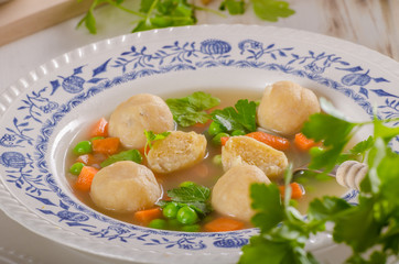 Fresh vegetable soup with chicken dumplings