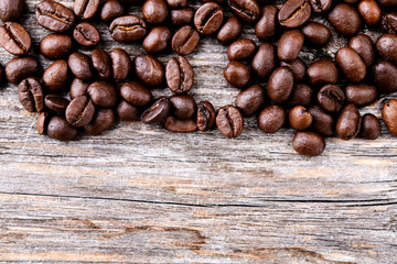 coffee beans on wooden ground