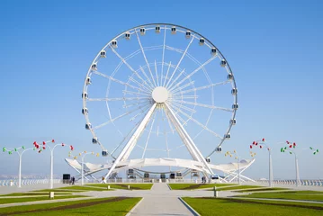 Deurstickers Ferris wheel close-up against the blue sky. Baku, Azerbaijan © sikaraha