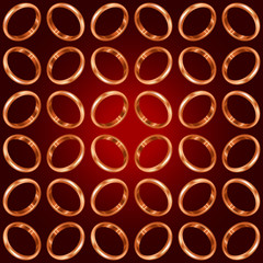 Seamless background of  gold wedding rings on burgundy background for romantic design.