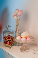 multicolored sweets on a white table ready for St. Valentine's Day celebration