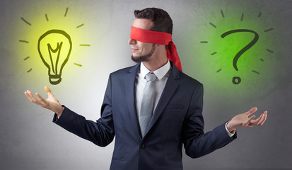 Businessman with idea versus question concept