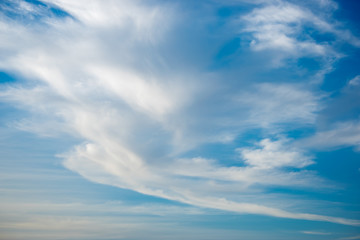 Whisky clouds in a blue sky