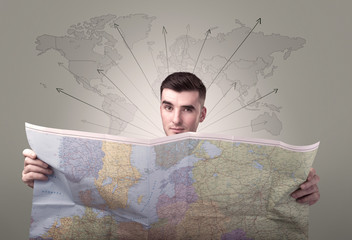 Young man holding map