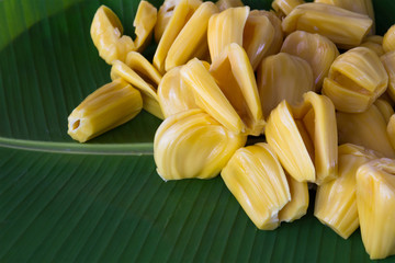 fresh jack fruit on green banana leaf, tropical Thailand fruit © Rattanachat