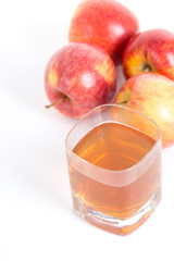 Apple cider vinegar and apple on white background.