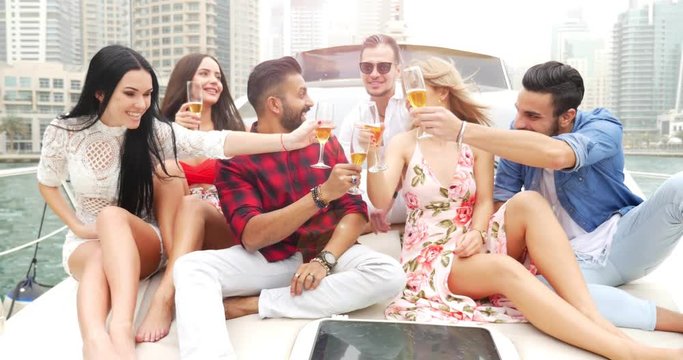 Group of friends celebrating on the boat