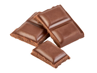 Milk chocolate pieces isolated on white background.
