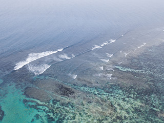 Aerial view of waves in shallow water.