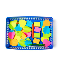 Sticky notes in blue tray