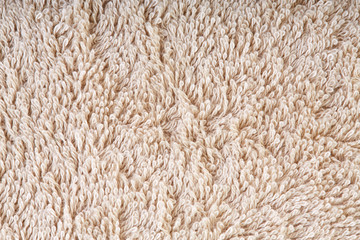 fabric and texture concept - close up of a towel terry cloth or terry textile background