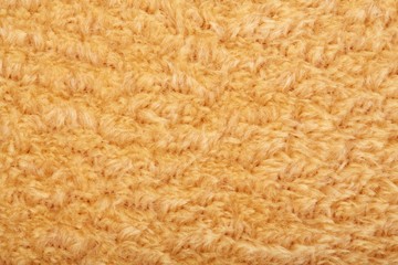 Texture of brown fluffy soft plush. Towel terry cloth, Soft texture cloth