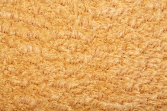 Texture of brown fluffy soft plush. Towel terry cloth, Soft texture cloth