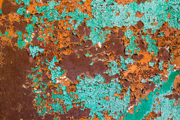 Old green paint on the metal and drips of rust. grunge vintage texture for background