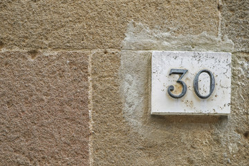 number thirty on a wall