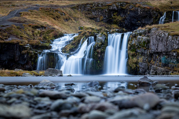Fototapeta na wymiar Waterfall and beautiful view at the kirkjufell mountain in iceland europe