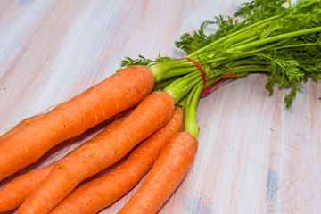 Fresh, raw, organic, bio, orange carrots. Healthy vegan vegetarian vegetable food