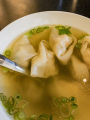 Wonton soup server with green onions