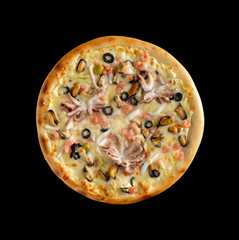 Freshly baked homemade pizza isolated on a black background. View from above