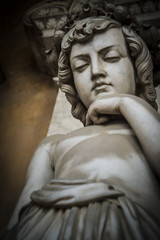 Worried angel immersed in a deep thought