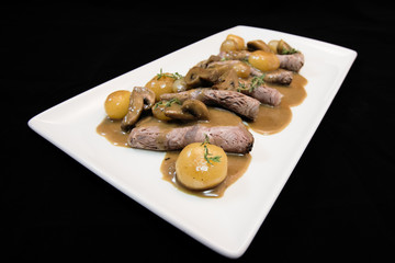 veal fattening black Angus, Dutch onions and mushrooms
