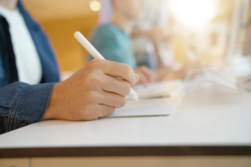 Closeup of student using graphic pad