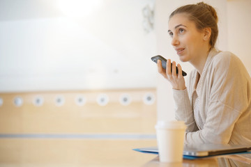 Student girl in hall talking on phone