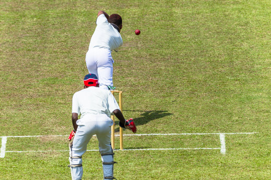 Cricket Action Batsman Ball Bowler Wicket Keeper Closeup unidentified.
