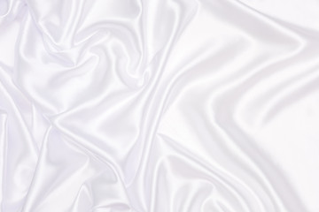 Crumpled of white satin for abstract and design,