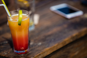 Alcohol orange daiquiri cocktail on beach bar