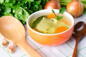 Fish soup served on the table in plate