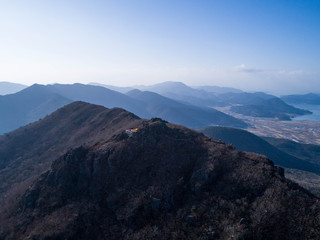 Obraz premium Aerial view of mountains, city and sea