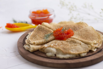 tasty red caviar is a real imitation of iodine with a festive meal pancakes Mardi Gras celebration