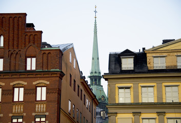 Fototapeta na wymiar Houses and old church in old town of Stockholm