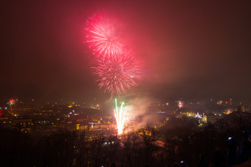 Vilnius, Lithuania January 01, 2017: Beutifull view to the main firework, at New Year night to Cathedral Square, belfry tower, Cathedral of St. Stanislaus and St. Vladislav, from hill of three crosses