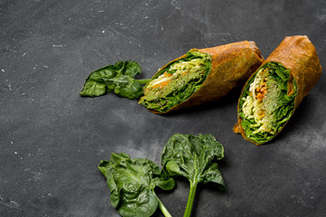 Diet and vegetarian lunch fast food - spring rolls with salad.