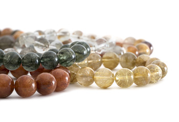 Beautiful translucent assorted colors Rutilated Quartz or Venus’ hairstone bead in bracelets on...