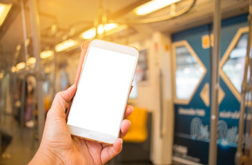 Online searching social networks by Smartphone Concept: Businesswoman using cell phone sync app by network internet wireless development mobile in sky train background. Mock up for texting