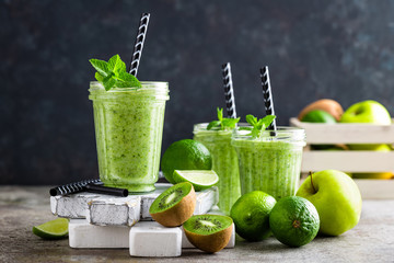 Smoothie with fresh green apple, kiwi and lime. Summer vitamin refreshing beverage. Healthy detox...