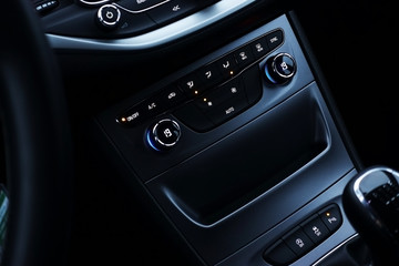 Modern car central console dashboard with futuristic design
