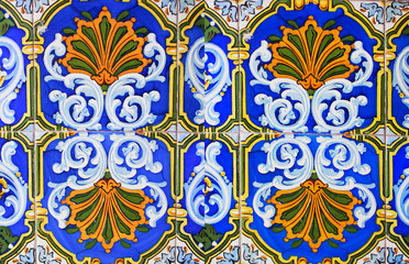 Detail of the traditional tiles from facade of old house. Decorative tiles.Valencian traditional tiles. Floral ornament.