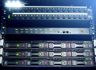 Server hard drives SATA. Internet server in datacenter close-up view. Hard drives in a computer rack