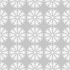White floral seamless pattern on gray background