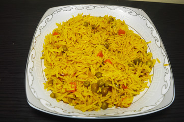 Homemade basmati rice with peas and carrots