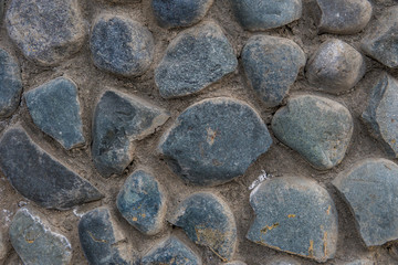 Stone wall background. Texture of natural stones