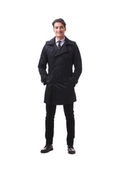 Young businessman wearing winter coat isolated on white