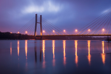 Fototapeta na wymiar Siekierkowski bridge at night in Warsaw, Poland