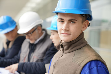 Portrait of young man in construction industry training