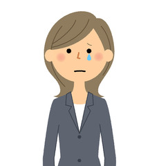 スーツの女性　泣く