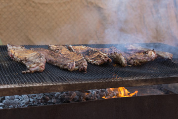 Outdoor Grilled Meat: Steaks and Sausages